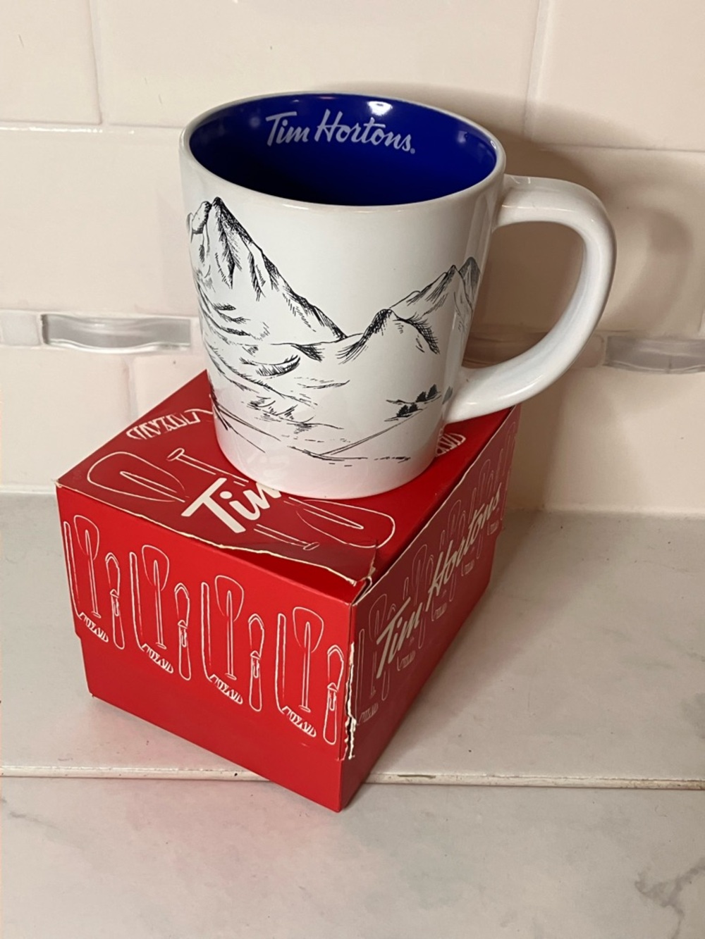 Tim Hortons White Ceramic Mug with Blue Interior and ski / Mountain Design